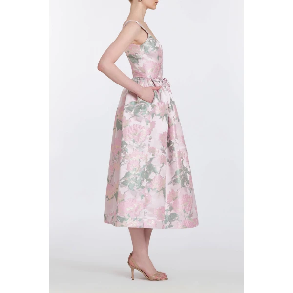 Markarian gowns with romantic neckline and structured silhouette