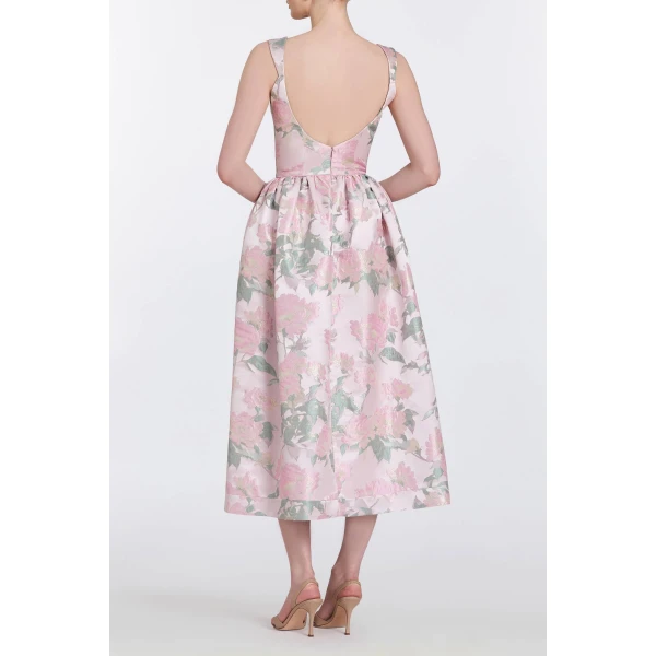 Markarian gowns with romantic neckline and structured silhouette