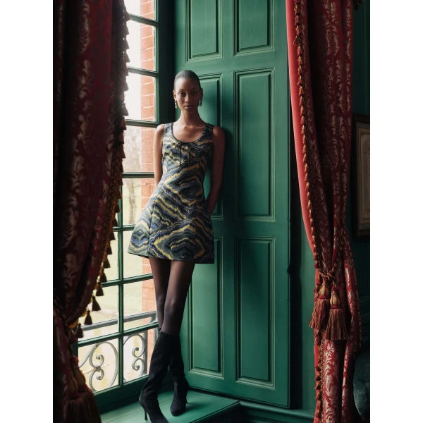 Markarian dress with romantic neckline and structured silhouette