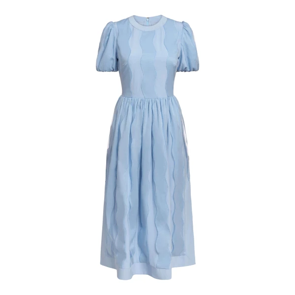 Markarian gown with romantic neckline and structured silhouette