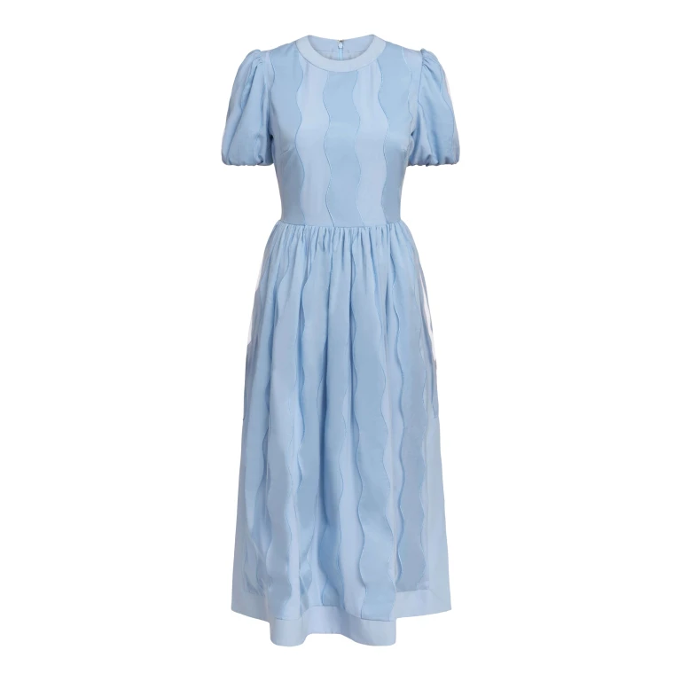 Markarian gown with romantic neckline and structured silhouette