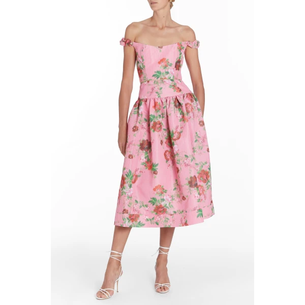 Markarian dresses with romantic neckline and structured silhouette