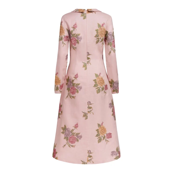 Markarian dresses with romantic neckline and structured silhouette