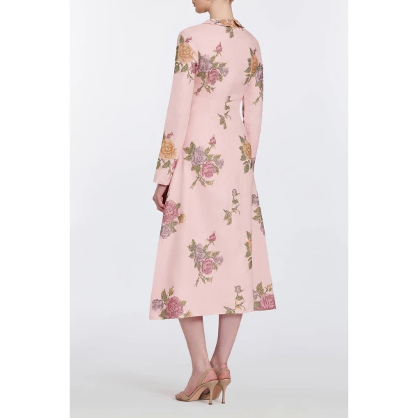 Markarian gowns with romantic neckline and structured silhouette