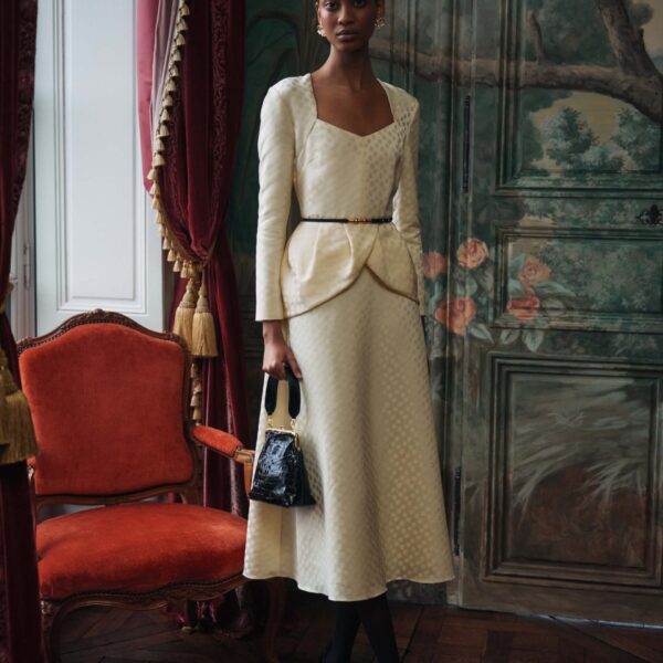Markarian dresses with romantic neckline and structured silhouette