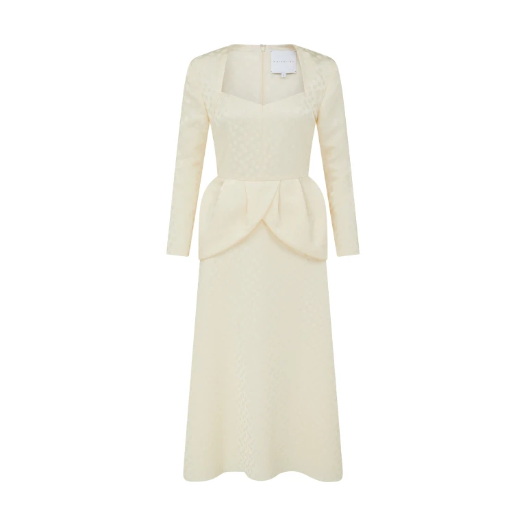 Markarian gown with romantic neckline and structured silhouette