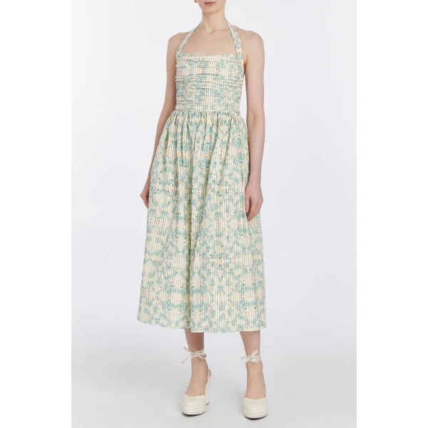 Markarian dresses with romantic neckline and structured silhouette