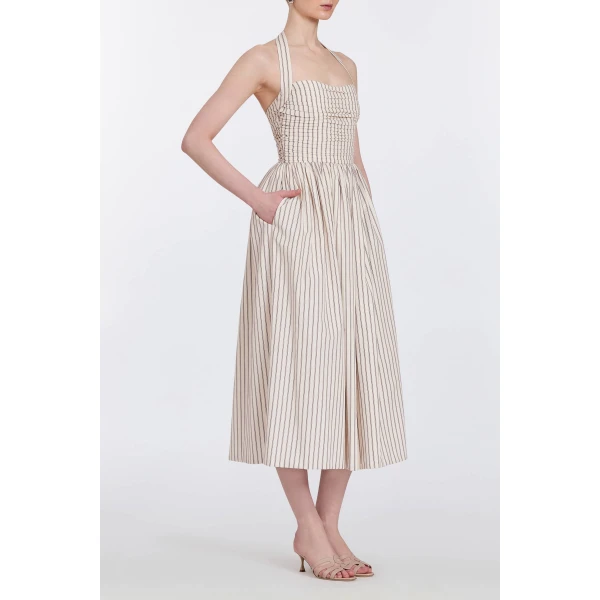 Markarian gowns with romantic neckline and structured silhouette