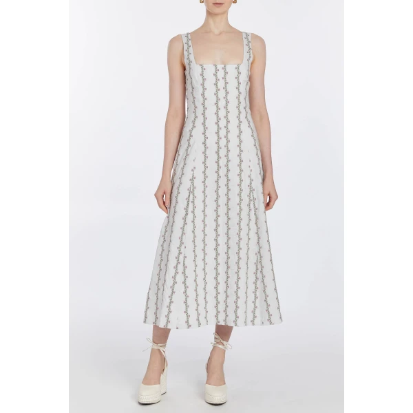 Markarian dresses with romantic neckline and structured silhouette