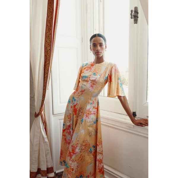 Markarian dress with romantic neckline and structured silhouette