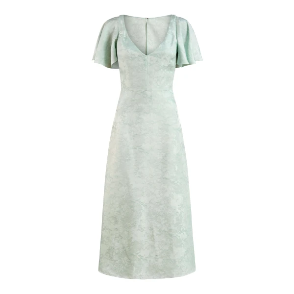 Markarian gown with romantic neckline and structured silhouette