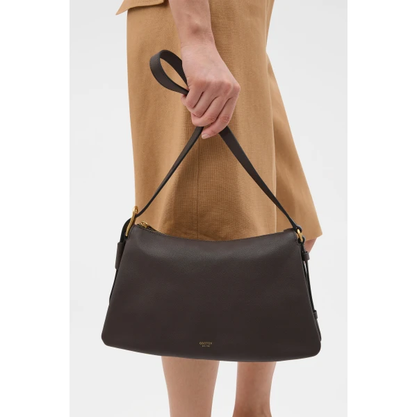 Profile view of model wearing the Oroton CALI SHOULDER BAG in DARK CHOCOLATE and Premium smooth leather for Women