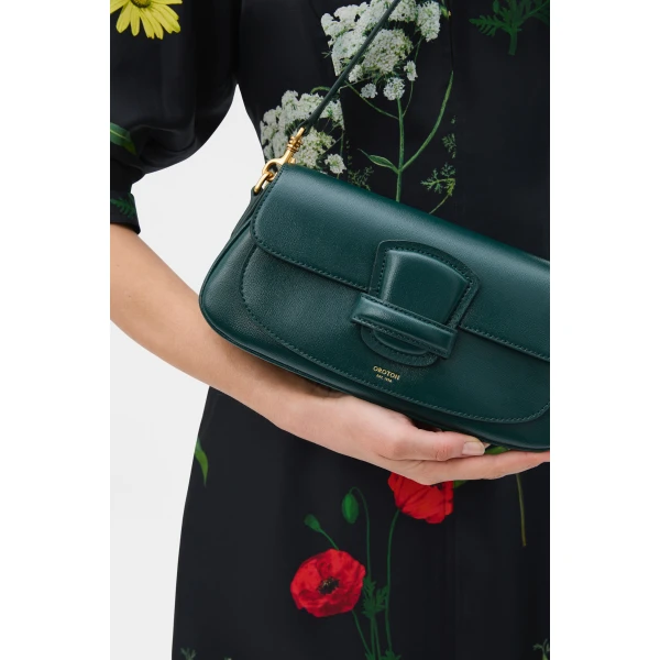 Profile view of model wearing the Oroton CARTER BAGUETTE in IVY and Premium saffiano leather for Women