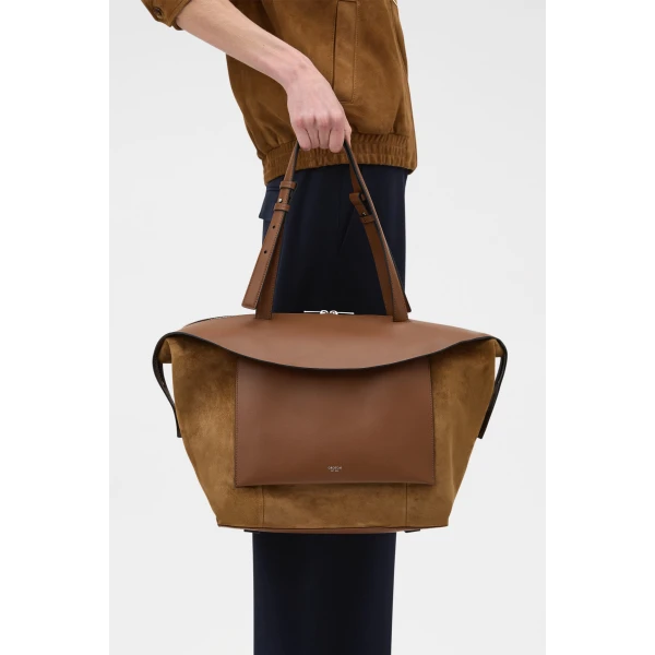 Profile view of model wearing the Oroton MICA MEDIUM TOTE SUEDE in TEAK and Premium suede leather for Women