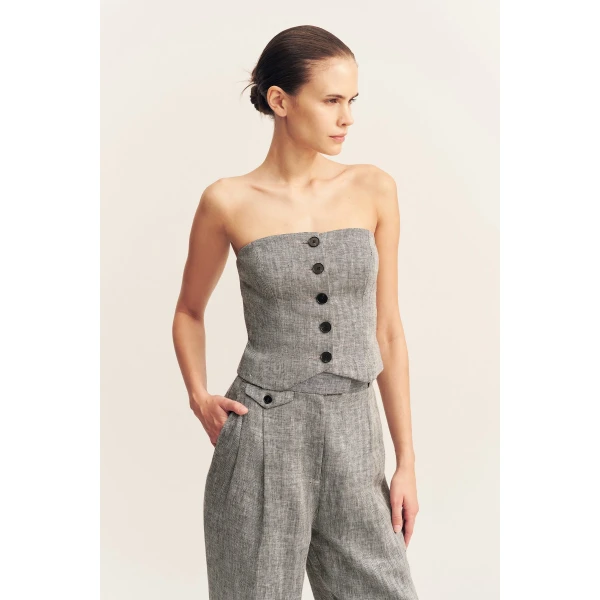 High waisted tailored pant with coin pocket detail in a herringbone pure linen.
