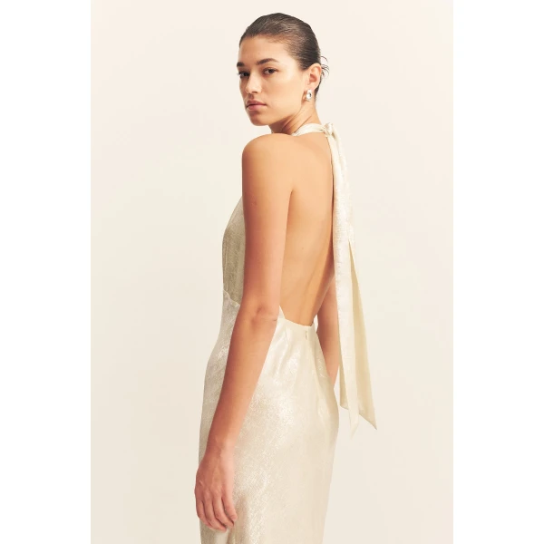 Plunged halter neck maxi dress in bubbly in a lightweight metallic foil.