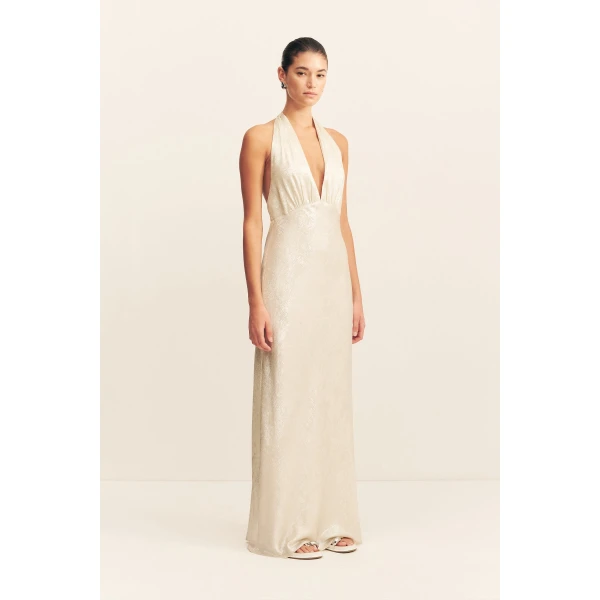 Plunged halter neck maxi dress in bubbly in a lightweight metallic foil.
