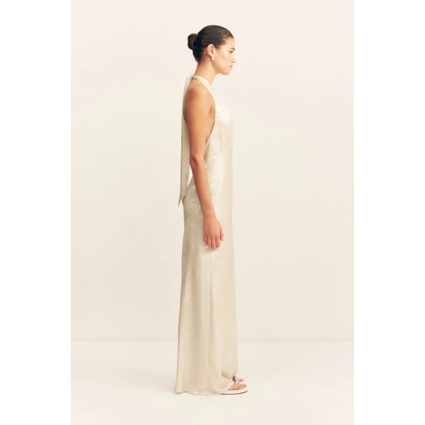 Plunged halter neck maxi dress in bubbly in a lightweight metallic foil.