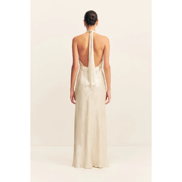 Plunged halter neck maxi dress in bubbly in a lightweight metallic foil.