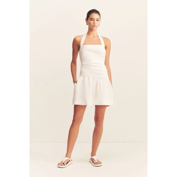 Halter draped mini dress in a premium linen blend in ivory.