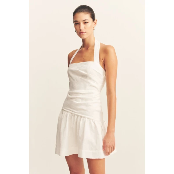 Halter draped mini dress in a premium linen blend in ivory.