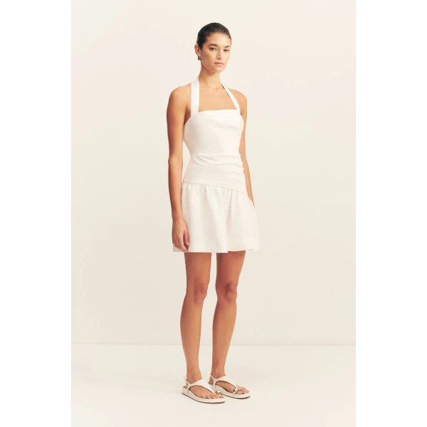 Halter draped mini dress in a premium linen blend in ivory.