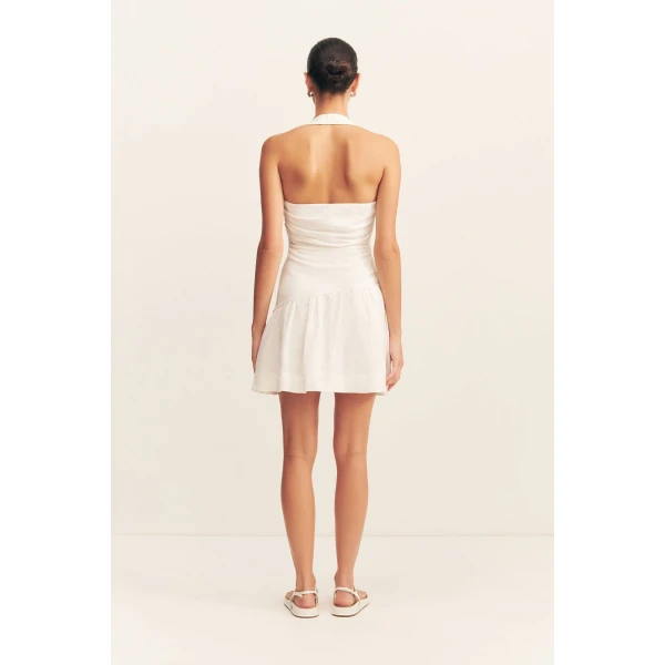 Halter draped mini dress in a premium linen blend in ivory.