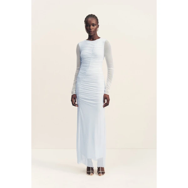 Gathered long sleeve maxi dress in sky in a sheer mesh.