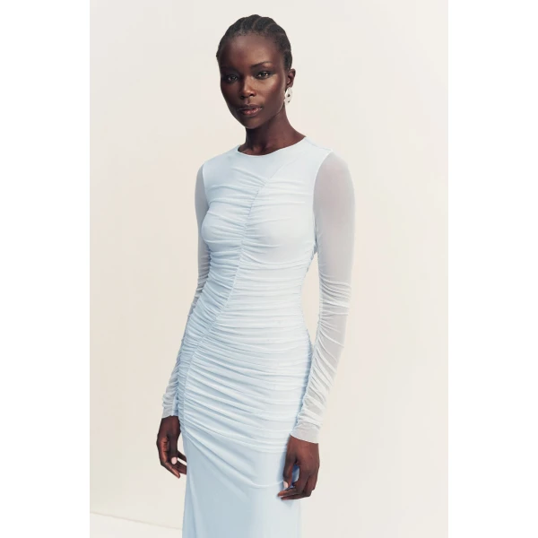 Gathered long sleeve maxi dress in sky in a sheer mesh.