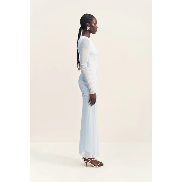 Gathered long sleeve maxi dress in sky in a sheer mesh.