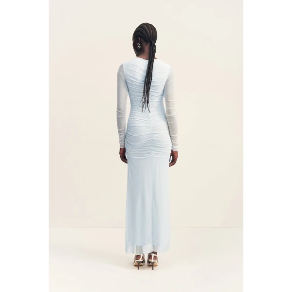 Gathered long sleeve maxi dress in sky in a sheer mesh.