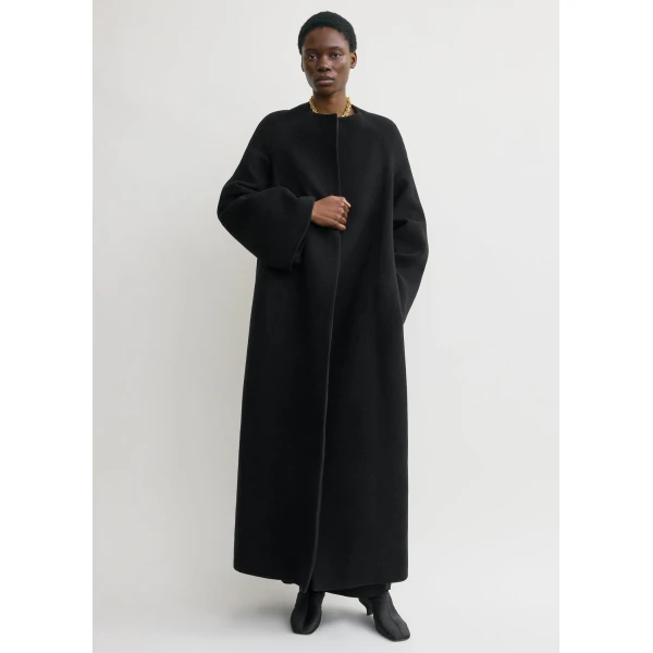Toteme Coats with minimalist design at Luxury Shoes 