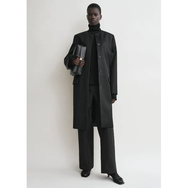 Toteme Coats with minimalist design at Luxury Shoes 