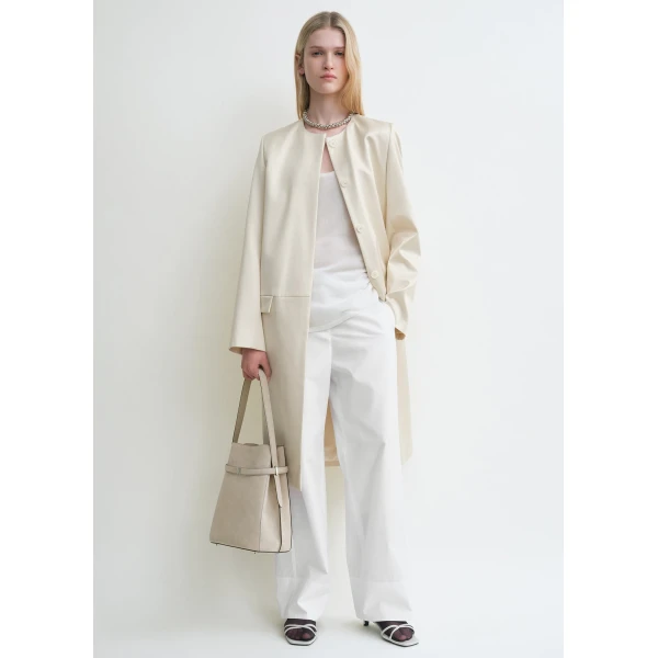 Toteme Coats with minimalist design at Luxury Shoes 