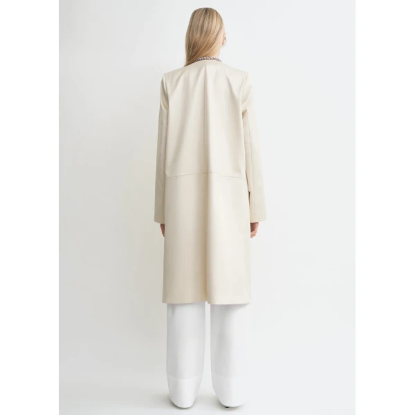Toteme Coats with minimalist design at Luxury Shoes 