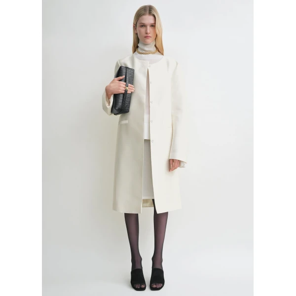 Toteme Coats with minimalist design at Luxury Shoes 