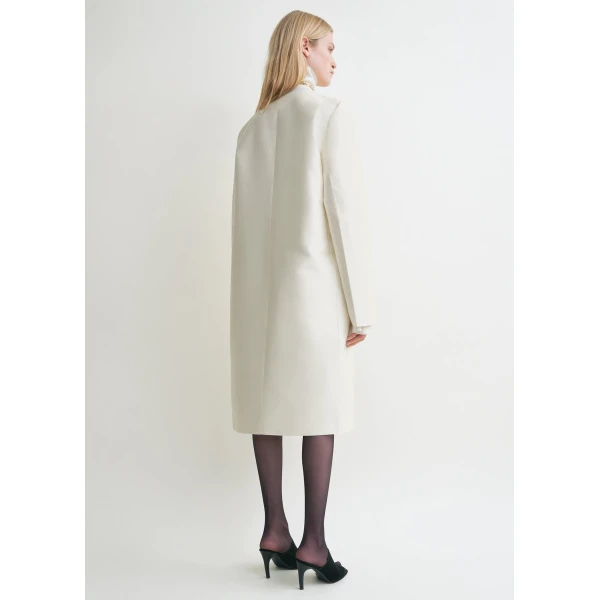 Toteme Coats with minimalist design at Luxury Shoes 