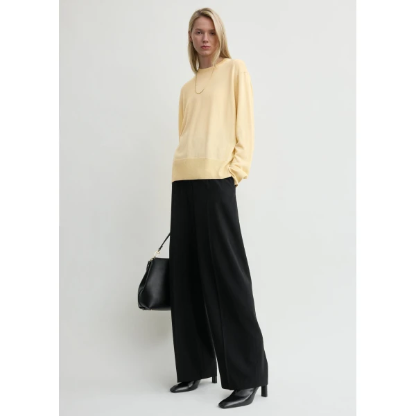 Toteme Knitwear with minimalist design at Luxury Shoes 