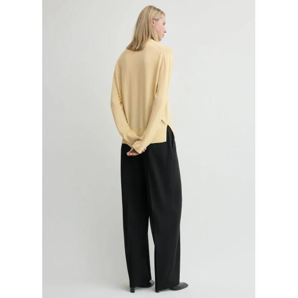 Toteme Knitwear with minimalist design at Luxury Shoes 