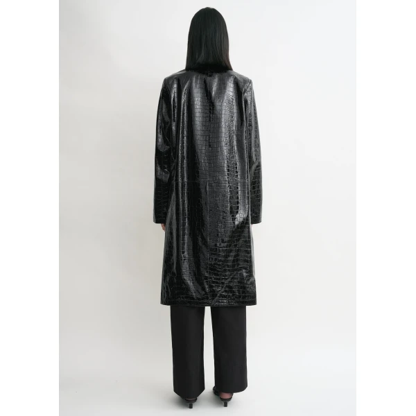 Toteme Coats with minimalist design at Luxury Shoes 