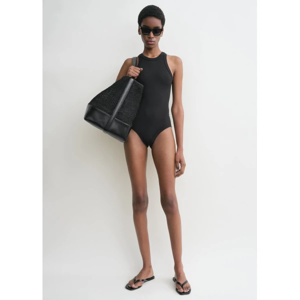 Toteme Beachwear with minimalist design at Luxury Shoes 
