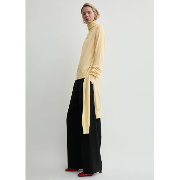 Toteme Knitwear with minimalist design at Luxury Shoes 