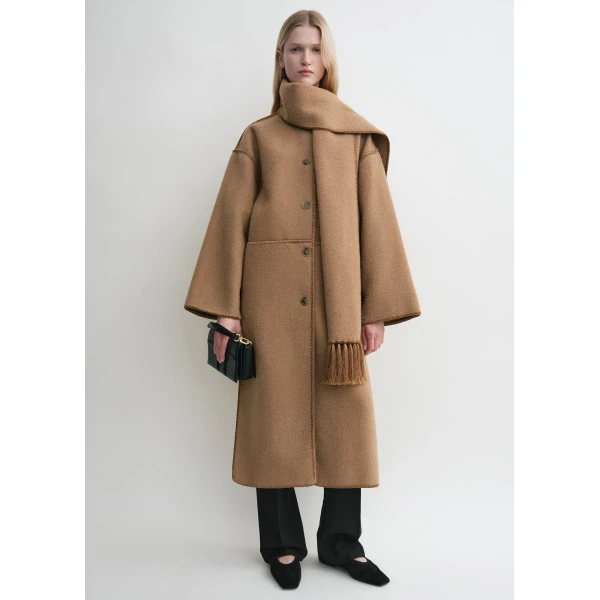 Toteme Coats with minimalist design at Luxury Shoes 