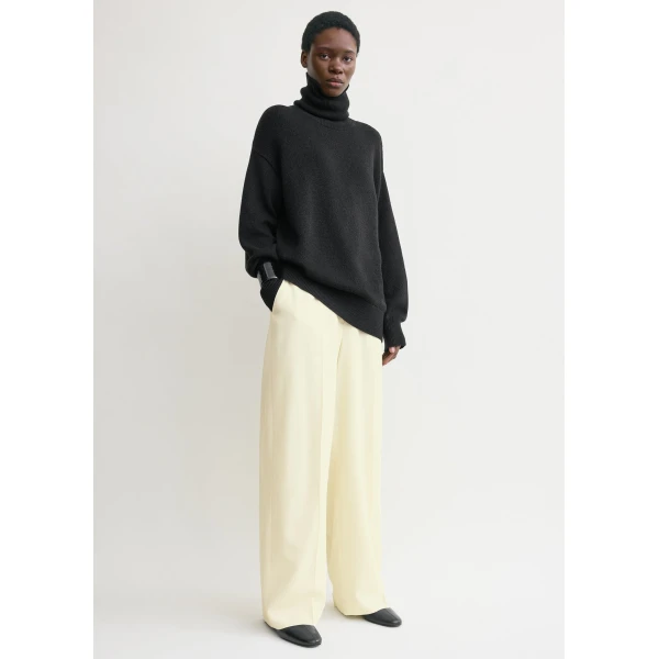 Toteme Knitwear with minimalist design at Luxury Shoes 