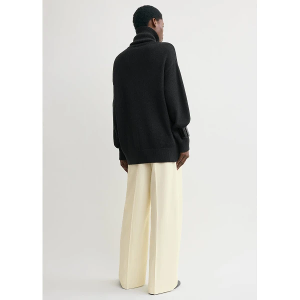 Toteme Knitwear with minimalist design at Luxury Shoes 