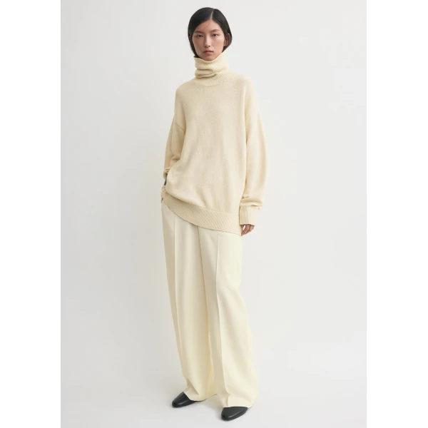 Toteme Knitwear with minimalist design at Luxury Shoes 