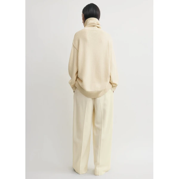 Toteme Knitwear with minimalist design at Luxury Shoes 