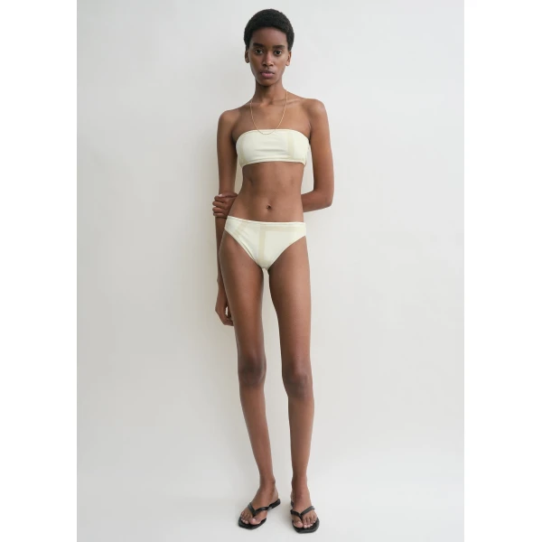 Toteme Beachwear with minimalist design at Luxury Shoes 