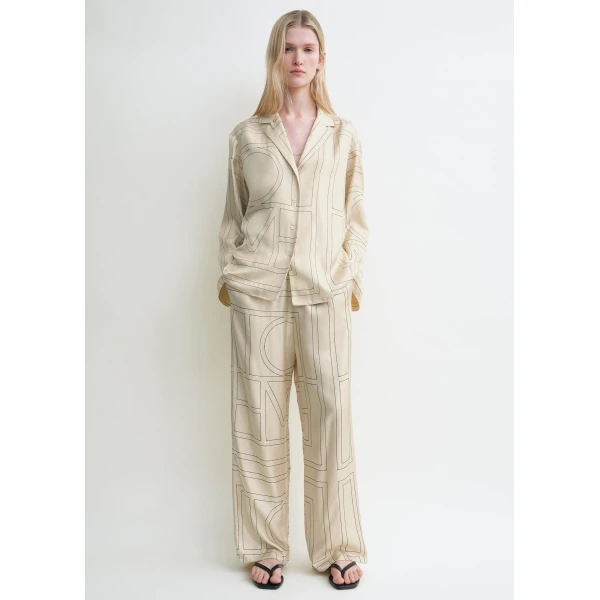 Toteme Tops with minimalist design at Luxury Shoes 