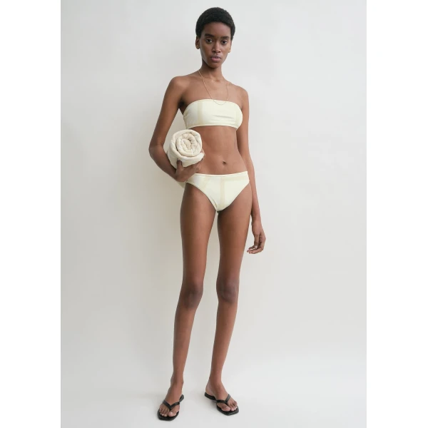 Toteme Beachwear with minimalist design at Luxury Shoes 